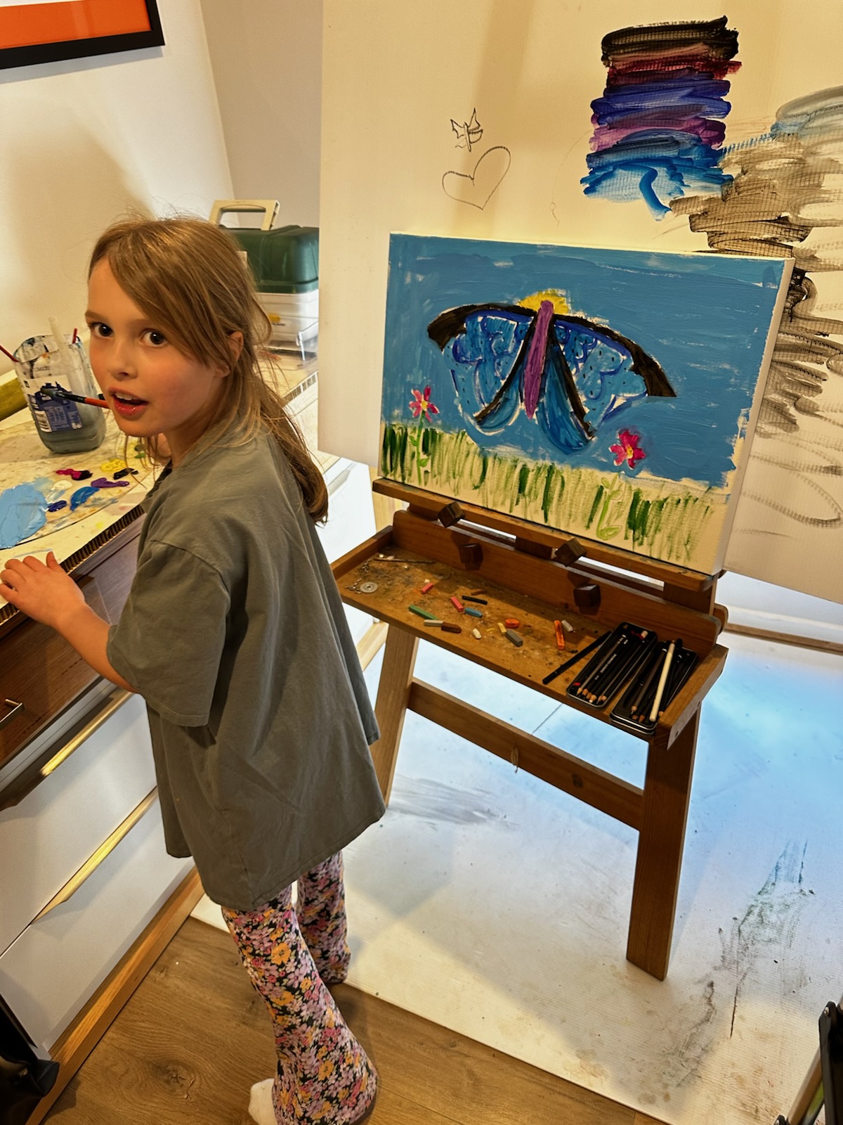 David Lacy painting with family